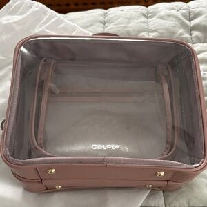 Calpak Mauve Transparent Travel Case